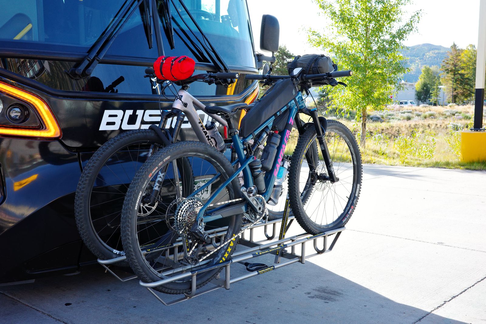 Two bikes on the 7:00 AM West Line's front rack; the other two rode in the belly of the beast, front wheels off.