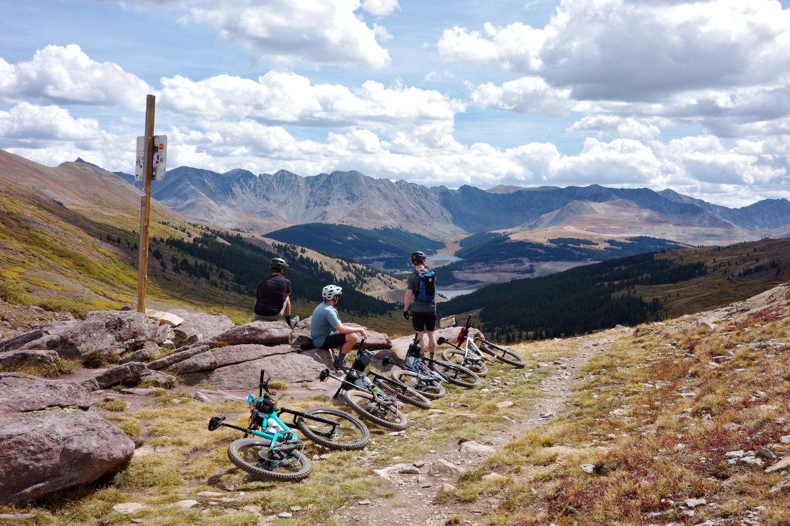 Looking down toward Camp Hale from the top of the descent. Four of us — one is always behind the camera.